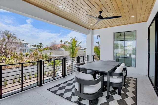 723 S Blvd Of The Presidents, Sarasota, FL 34236 - balcony featuring a ceiling fan and outdoor dining area