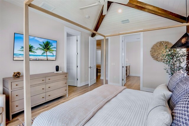 723 S Blvd Of The Presidents, Sarasota, FL 34236 - bedroom featuring light wood-style floors, visible vents, baseboards, and lofted ceiling with beams