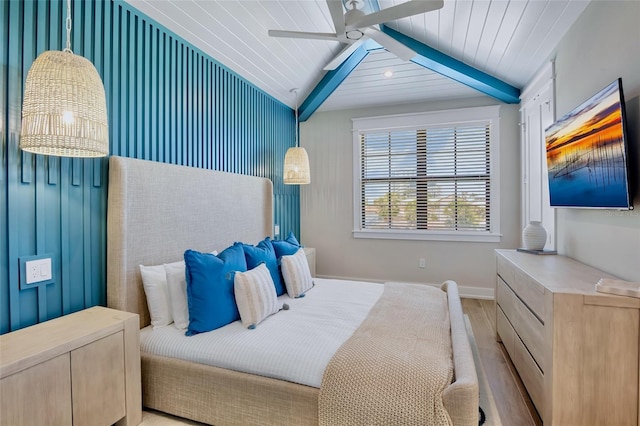 723 S Blvd Of The Presidents, Sarasota, FL 34236 - bedroom featuring lofted ceiling with beams, wooden ceiling, a ceiling fan, and light wood-style floors