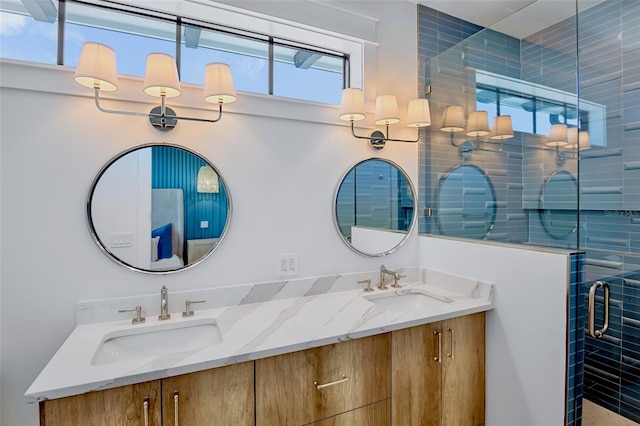 723 S Blvd Of The Presidents, Sarasota, FL 34236 - bathroom with a sink, a shower stall, and double vanity