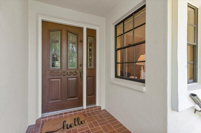 7639 Fairway Woods Dr Unit 605, Sarasota, FL 34238 - entrance to property featuring a porch and stucco siding