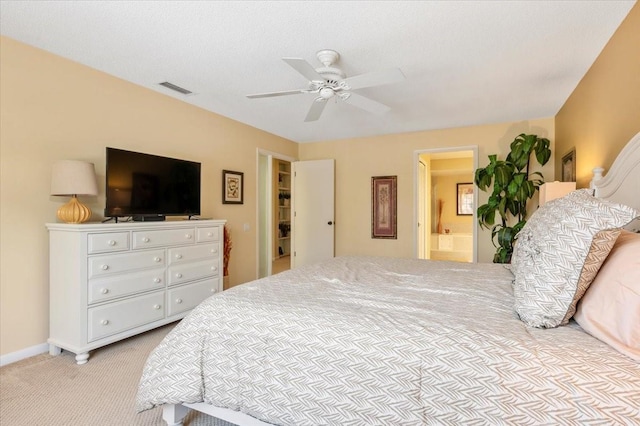 7639 Fairway Woods Dr Unit 605, Sarasota, FL 34238 - bedroom featuring baseboards, visible vents, light colored carpet, a ceiling fan, and connected bathroom