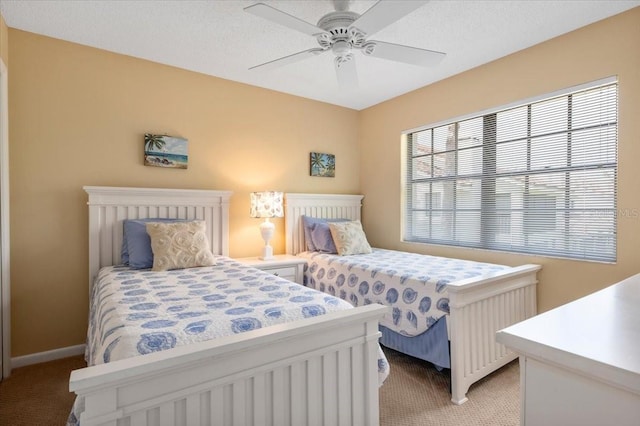 7639 Fairway Woods Dr Unit 605, Sarasota, FL 34238 - bedroom featuring light colored carpet, baseboards, and a ceiling fan
