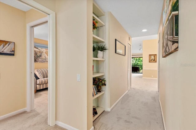 7639 Fairway Woods Dr Unit 605, Sarasota, FL 34238 - hallway with recessed lighting, carpet flooring, and baseboards
