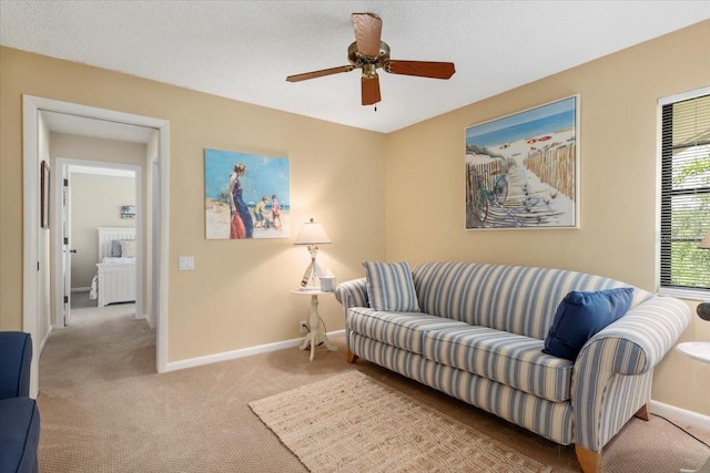 7639 Fairway Woods Dr Unit 605, Sarasota, FL 34238 - living area with carpet, a ceiling fan, and baseboards