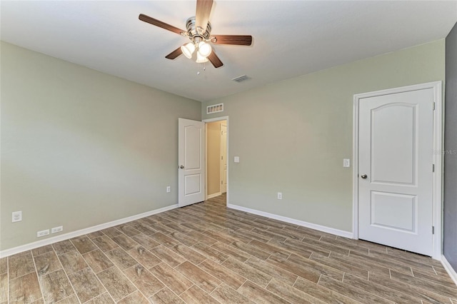 2084 La Palma Ave, Port Charlotte, FL 33953 - unfurnished bedroom with wood finished floors and baseboards