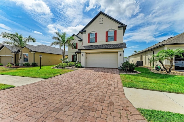 2084 La Palma Ave, Port Charlotte, FL 33953 - traditional home with stucco siding, decorative driveway, central AC, and an attached garage