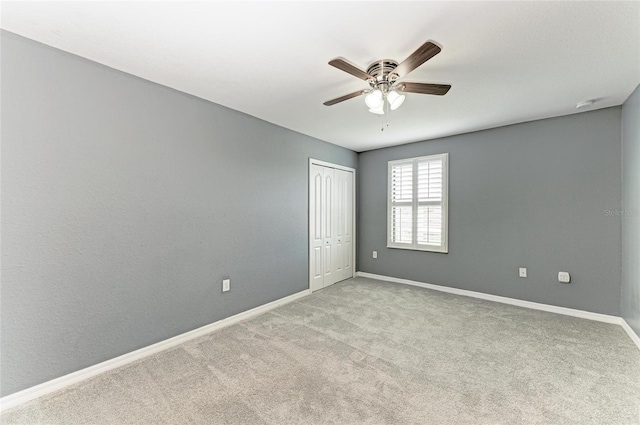2084 La Palma Ave, Port Charlotte, FL 33953 - carpeted spare room featuring ceiling fan, baseboards, and a smoke detector