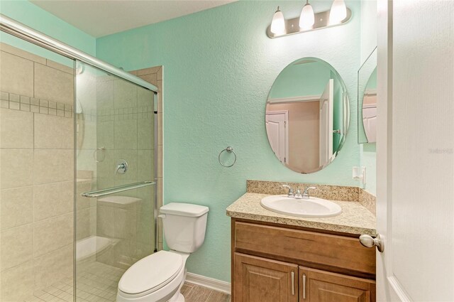 2084 La Palma Ave, Port Charlotte, FL 33953 - bathroom with toilet, vanity, and a shower stall
