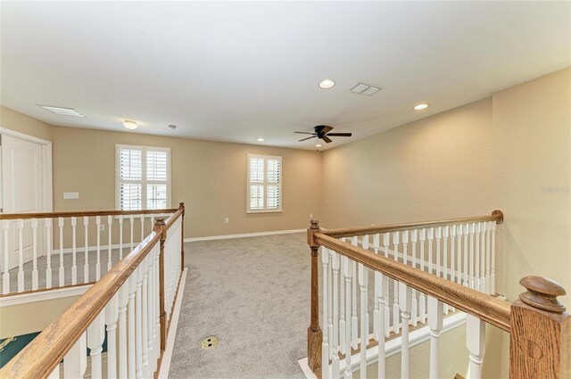 2084 La Palma Ave, Port Charlotte, FL 33953 - hallway with an upstairs landing, carpet floors, baseboards, and recessed lighting