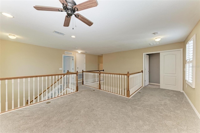 2084 La Palma Ave, Port Charlotte, FL 33953 - carpeted empty room featuring baseboards and a ceiling fan
