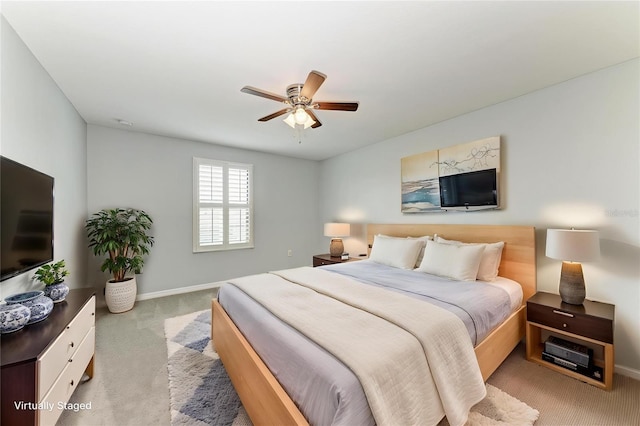 2084 La Palma Ave, Port Charlotte, FL 33953 - bedroom featuring light carpet, ceiling fan, and baseboards