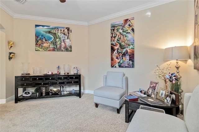 living area with carpet floors, ornamental molding, and baseboards