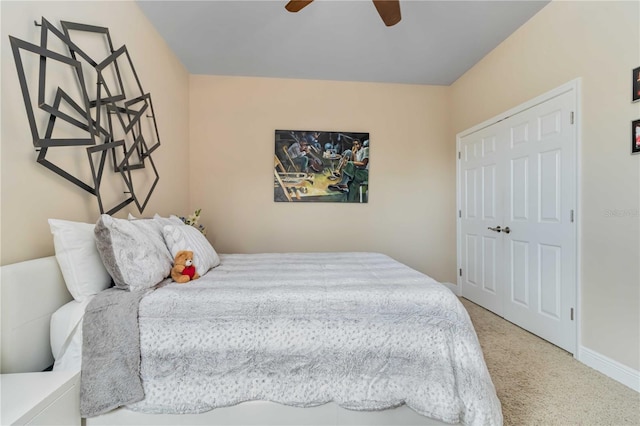 bedroom with carpet floors, a ceiling fan, and baseboards