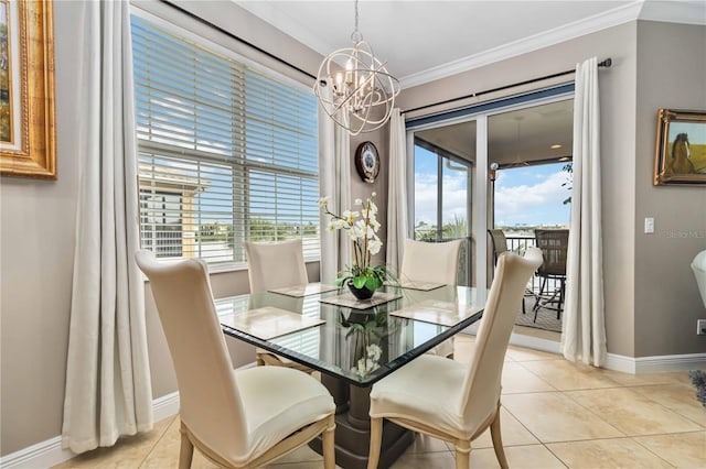 dining space with an inviting chandelier, plenty of natural light, baseboards, light tile patterned floors, and ornamental molding