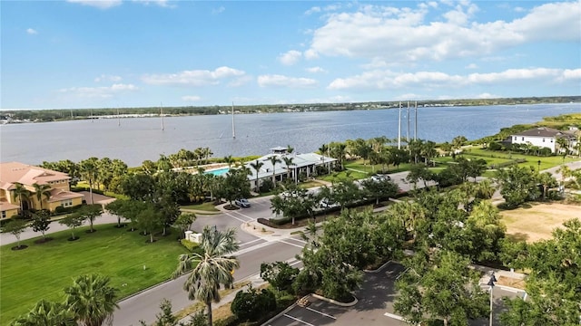 birds eye view of property featuring a water view