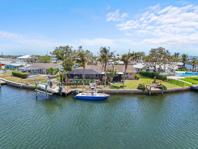 10432 Sandpiper Rd W, Bradenton, FL 34209 - view of dock with boat lift and a water view