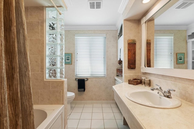10432 Sandpiper Rd W, Bradenton, FL 34209 - full bathroom featuring tile patterned floors, visible vents, toilet, and a washtub