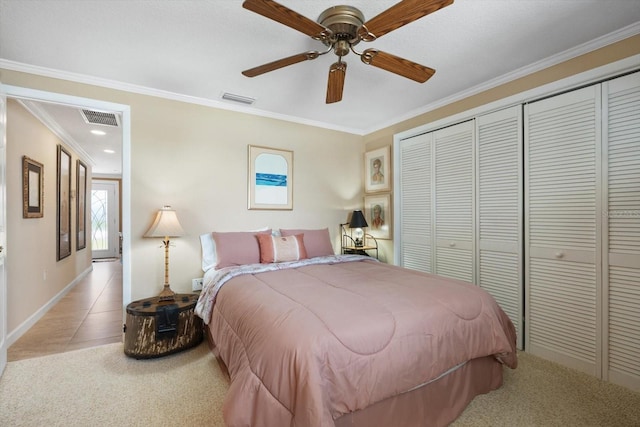 10432 Sandpiper Rd W, Bradenton, FL 34209 - carpeted bedroom featuring baseboards, visible vents, a closet, and crown molding