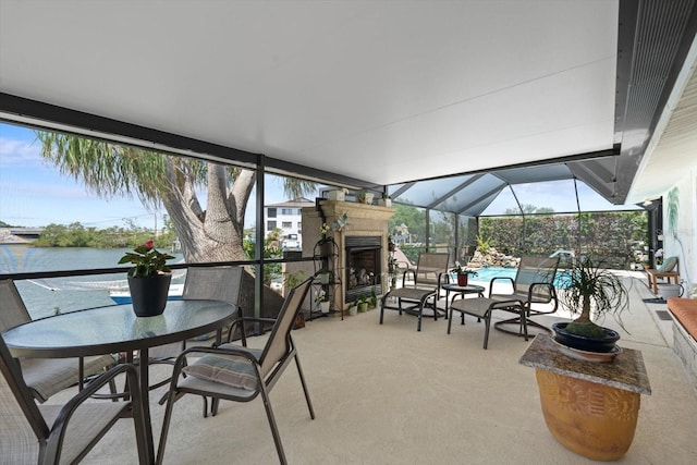 10432 Sandpiper Rd W, Bradenton, FL 34209 - sunroom / solarium with a fireplace