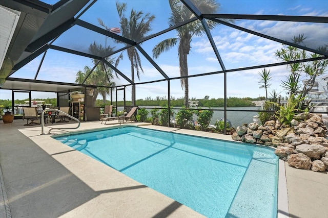 10432 Sandpiper Rd W, Bradenton, FL 34209 - pool with a lanai, a water view, and a patio area
