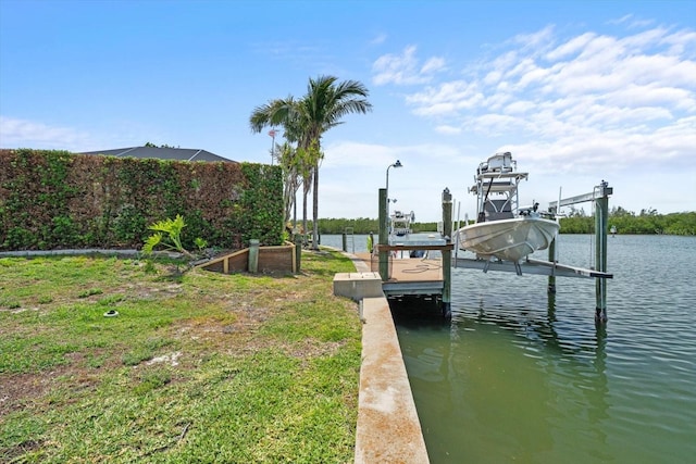 10432 Sandpiper Rd W, Bradenton, FL 34209 - dock area with boat lift and a water view
