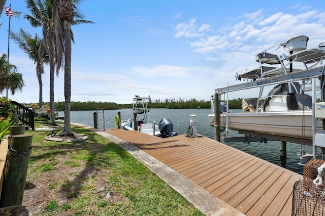 10432 Sandpiper Rd W, Bradenton, FL 34209 - view of dock with a water view and boat lift
