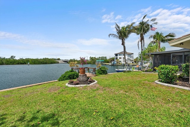10432 Sandpiper Rd W, Bradenton, FL 34209 - view of yard featuring a water view and a sunroom