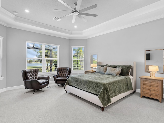 15037 Montello Way, Lakewood Ranch, FL 34211 - carpeted bedroom featuring ornamental molding, visible vents, baseboards, and a tray ceiling