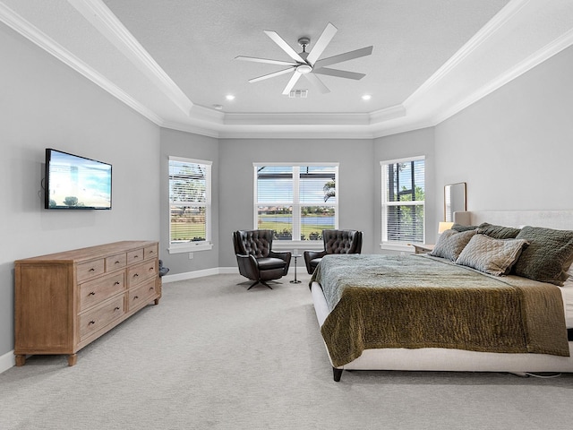 15037 Montello Way, Lakewood Ranch, FL 34211 - bedroom featuring multiple windows, a raised ceiling, visible vents, and light carpet