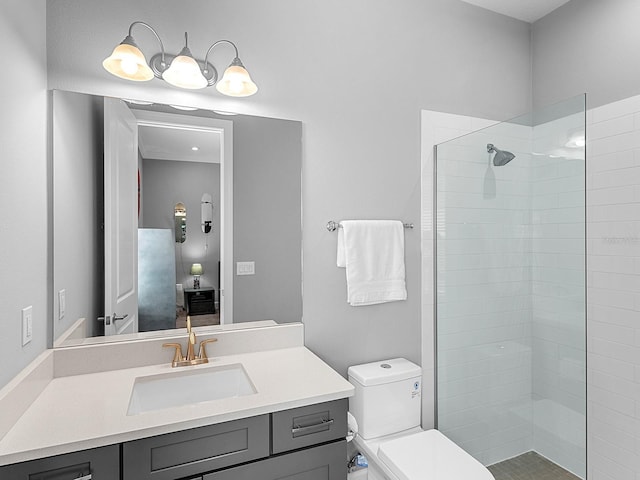 15037 Montello Way, Lakewood Ranch, FL 34211 - bathroom with toilet, a tile shower, and vanity