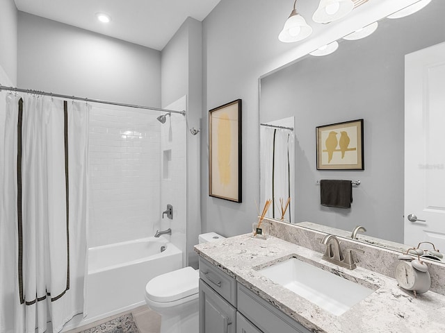 15037 Montello Way, Lakewood Ranch, FL 34211 - bathroom with shower / bath combo, toilet, and vanity