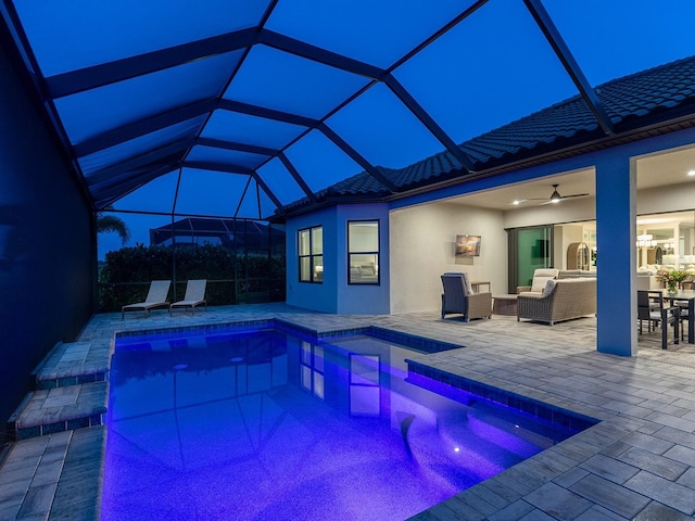 15037 Montello Way, Lakewood Ranch, FL 34211 - outdoor pool featuring a lanai, a patio, outdoor lounge area, and ceiling fan