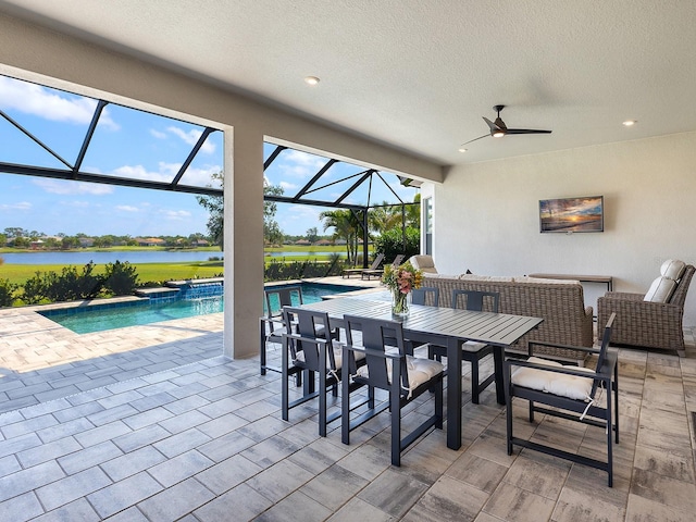 15037 Montello Way, Lakewood Ranch, FL 34211 - view of patio / terrace featuring a ceiling fan, an outdoor pool, a water view, and a lanai