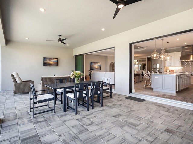 15037 Montello Way, Lakewood Ranch, FL 34211 - view of patio with a ceiling fan and outdoor dining area