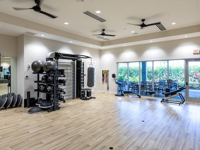 15037 Montello Way, Lakewood Ranch, FL 34211 - workout area with wood finished floors, ceiling fan, recessed lighting, and a high ceiling