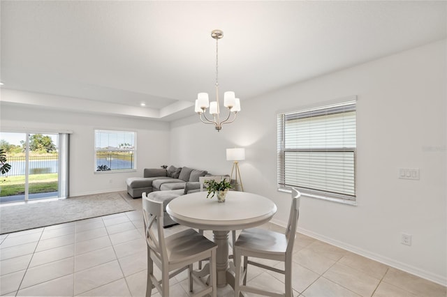 9725 Last Light Gln, Parrish, FL 34219 - dining area featuring light tile patterned floors, a chandelier, baseboards, and recessed lighting