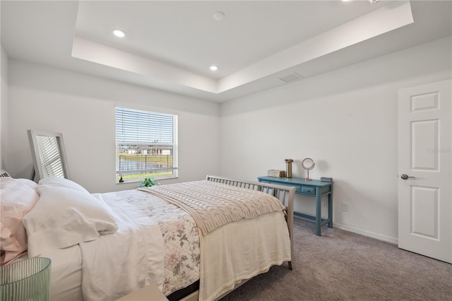 9725 Last Light Gln, Parrish, FL 34219 - bedroom featuring a raised ceiling, carpet flooring, recessed lighting, and baseboards