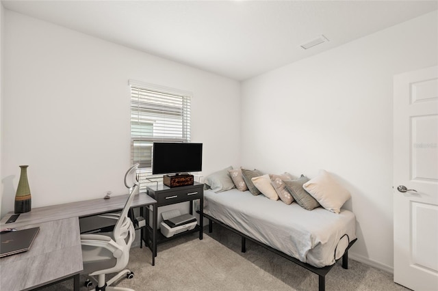 9725 Last Light Gln, Parrish, FL 34219 - bedroom featuring light carpet and a desk