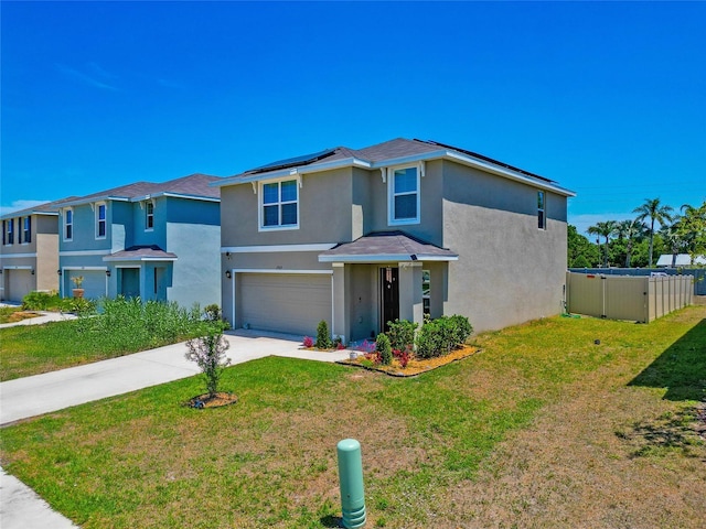 2969 Great Abaco Way, Bradenton, FL 34208 - traditional home featuring stucco siding, an attached garage, solar panels, and driveway