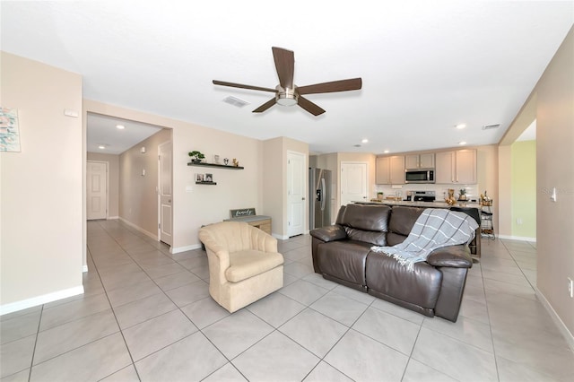 2969 Great Abaco Way, Bradenton, FL 34208 - living area featuring a ceiling fan, light tile patterned floors, baseboards, and recessed lighting