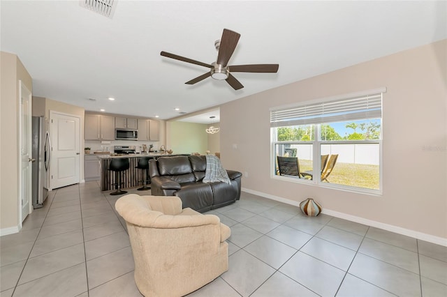 2969 Great Abaco Way, Bradenton, FL 34208 - living area with baseboards, ceiling fan, light tile patterned flooring, and recessed lighting