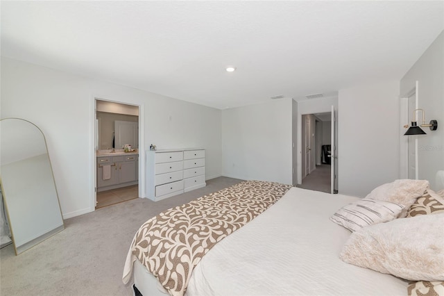 2969 Great Abaco Way, Bradenton, FL 34208 - bedroom featuring light colored carpet and connected bathroom