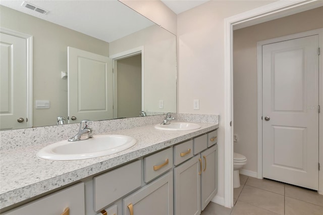 2969 Great Abaco Way, Bradenton, FL 34208 - full bath featuring tile patterned flooring, toilet, and double vanity