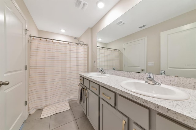 2969 Great Abaco Way, Bradenton, FL 34208 - bathroom featuring tile patterned floors, double vanity, a shower with curtain, and recessed lighting