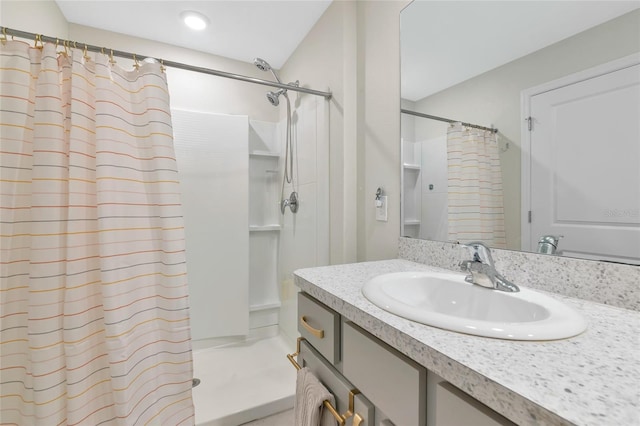 2969 Great Abaco Way, Bradenton, FL 34208 - bathroom featuring a shower with curtain and vanity