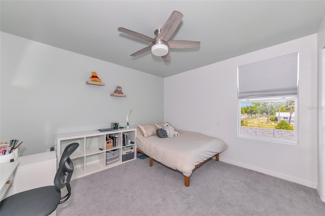 2969 Great Abaco Way, Bradenton, FL 34208 - carpeted bedroom with a desk, a ceiling fan, and baseboards