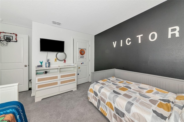 2969 Great Abaco Way, Bradenton, FL 34208 - bedroom with carpet and a wainscoted wall