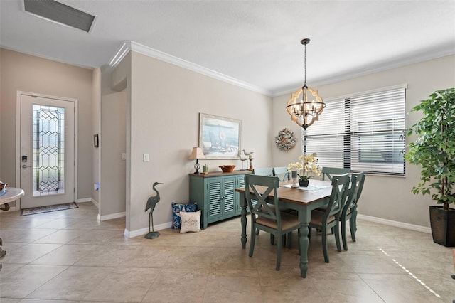 14309 Carolina Sky Pl, Lakewood Ranch, FL 34211 - dining room featuring baseboards, visible vents, ornamental molding, and a notable chandelier