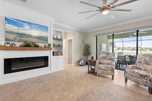 14309 Carolina Sky Pl, Lakewood Ranch, FL 34211 - living room with light tile patterned flooring, a glass covered fireplace, crown molding, a ceiling fan, and baseboards